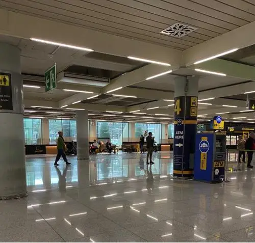 Palma airport arrivals meeting point at pillar 4, located directly next to an ATM.