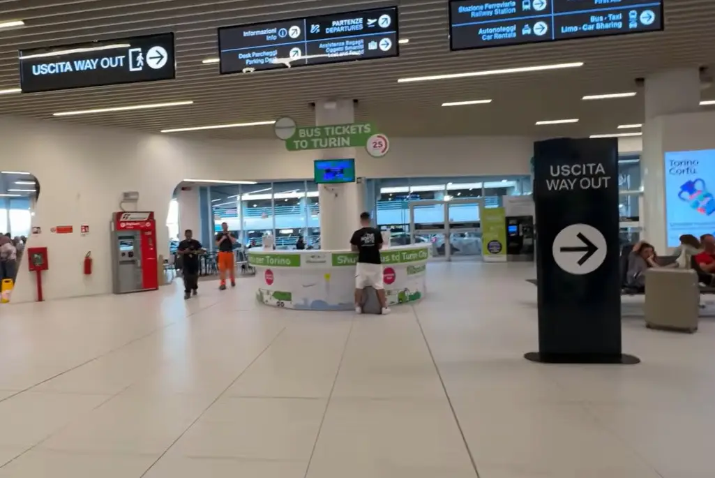 Meeting point in Turin airport where your driver will hold your name on a board