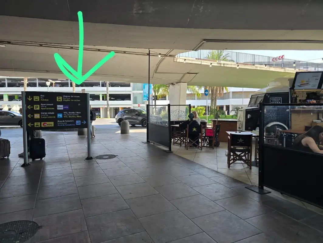 Valencia airport meetring point where drivers will wait with a name board