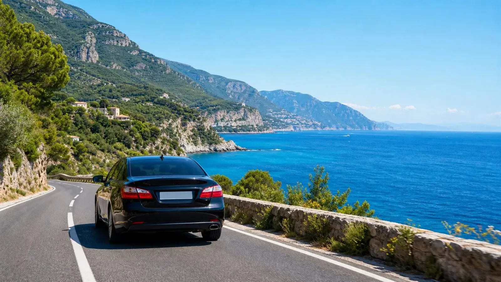 Taxi driving along a scenic coastal transfer route