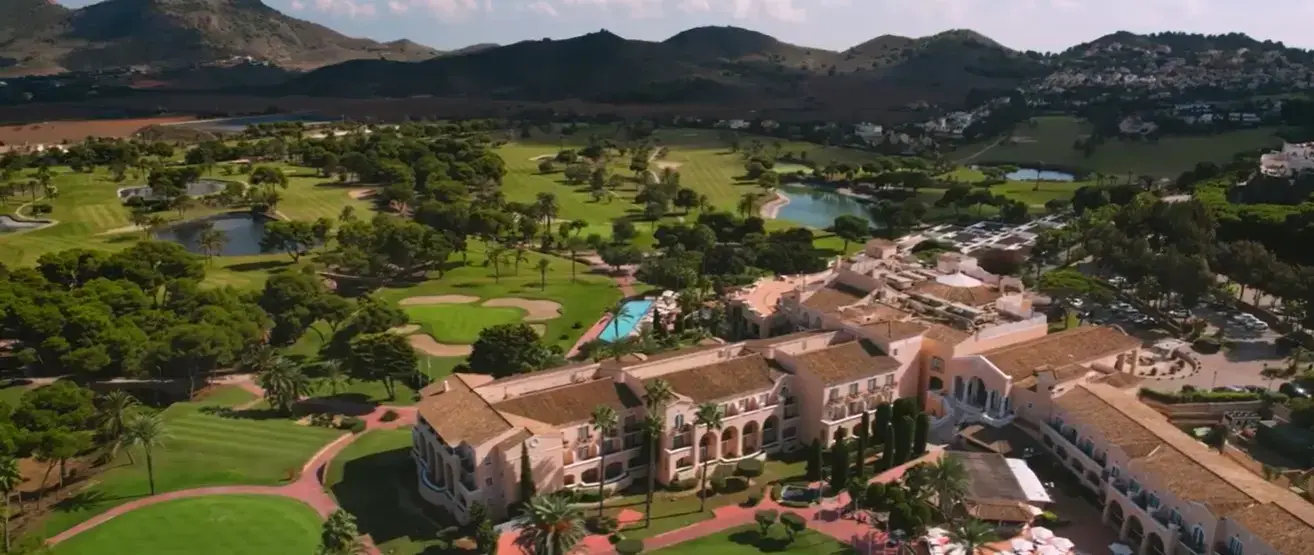 The world-class championship golf course and villas at La Manga Club resort, a premier destination reached via private taxi services from Alicante airport.