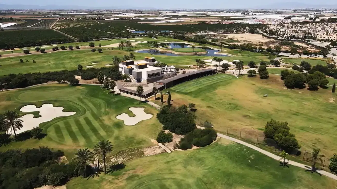 The beautifully maintained fairways and greens at La Roda Golf resort, a top destination for players booking private taxi services from Alicante airport.