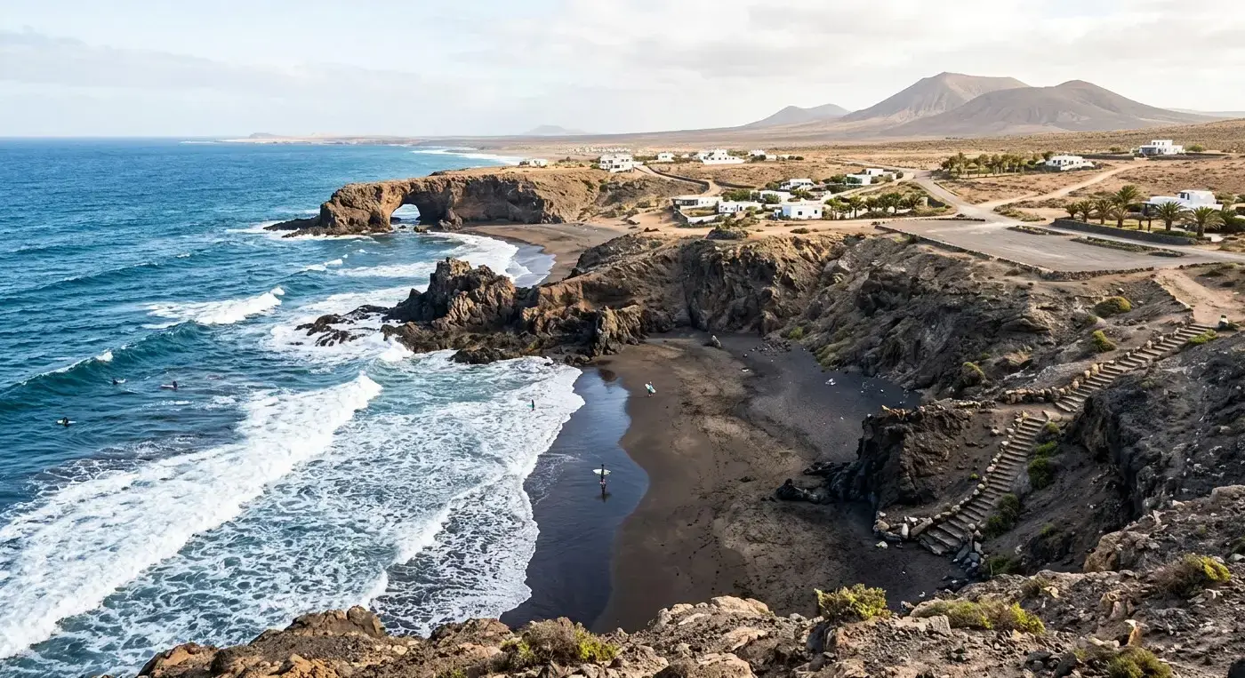 Rugged coastline and surf beach area of La Pared in Fuerteventura for private taxi airport transfers