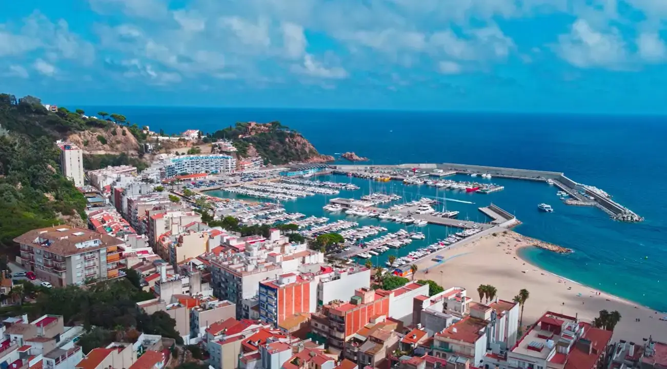 Scenic view of Blanes beach resort and Marina, a popular holiday destination for private transfers from Girona Airport.