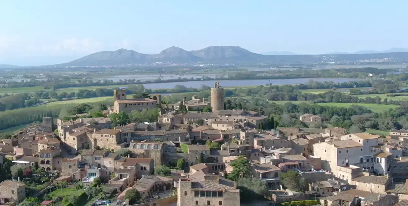 The ancient medieval stone streets of historic Pals town, a popular cultural destination for Cheap Taxis private airport transfer services from Girona Airport.