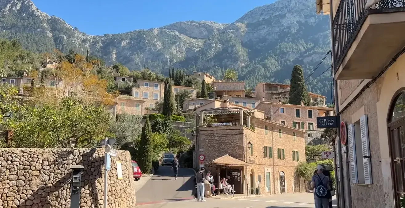 Private chauffeur and airport taxi service from Palma Airport navigating to boutique hotels and traditional stone villas in the mountain village of Deia, Mallorca