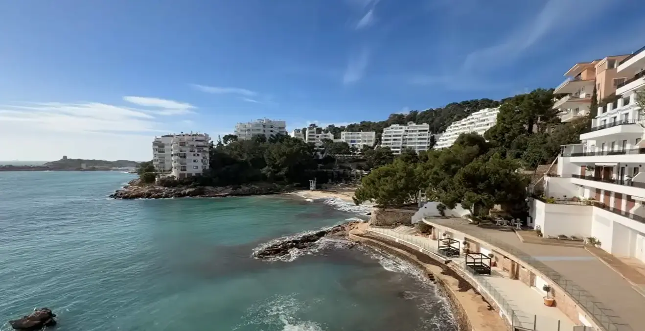 Direct private airport taxi transfer from Palma Airport to sea-view hotels and luxury coastal cove resorts in Illetas, Mallorca