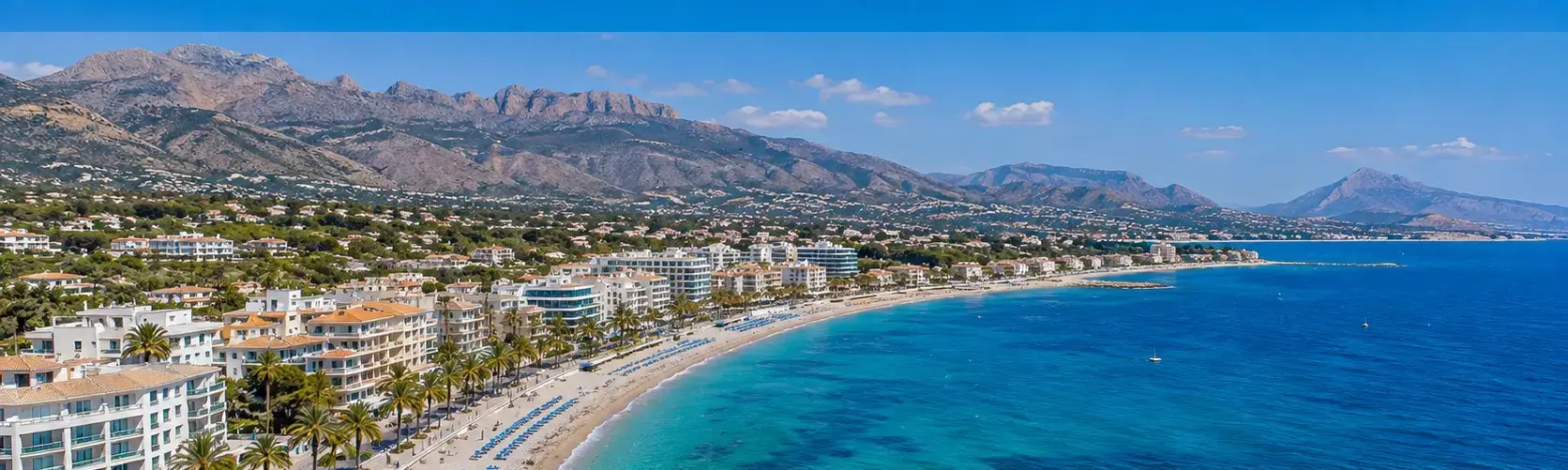 Scenic view of Albir beach resort, a popular destination for travelers booking private taxi services from Alicante airport.